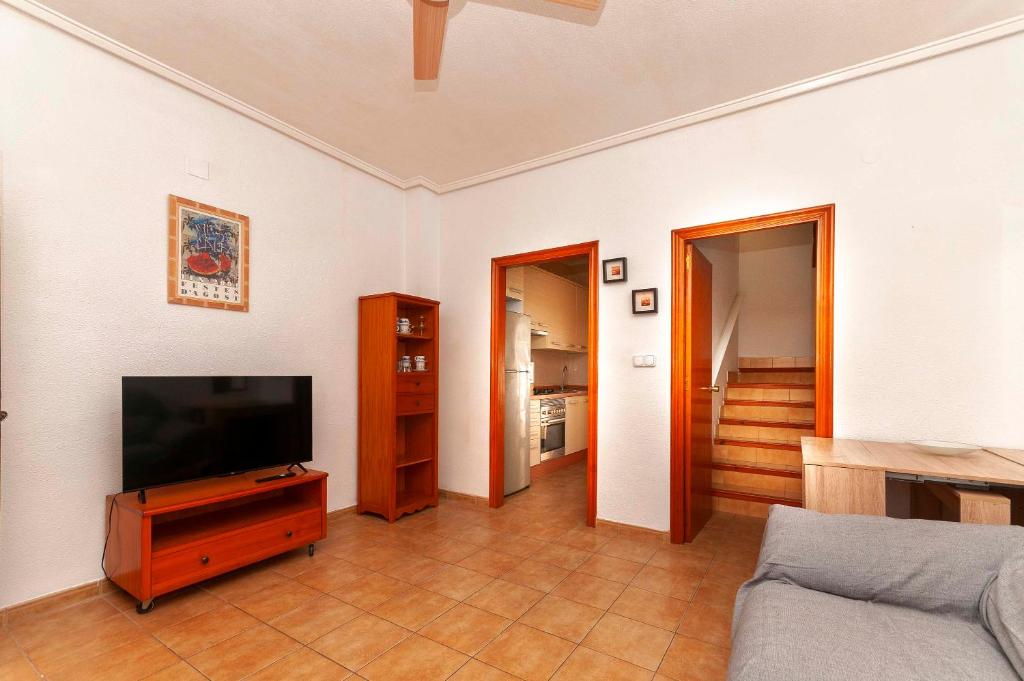 Acogedor salón con TV